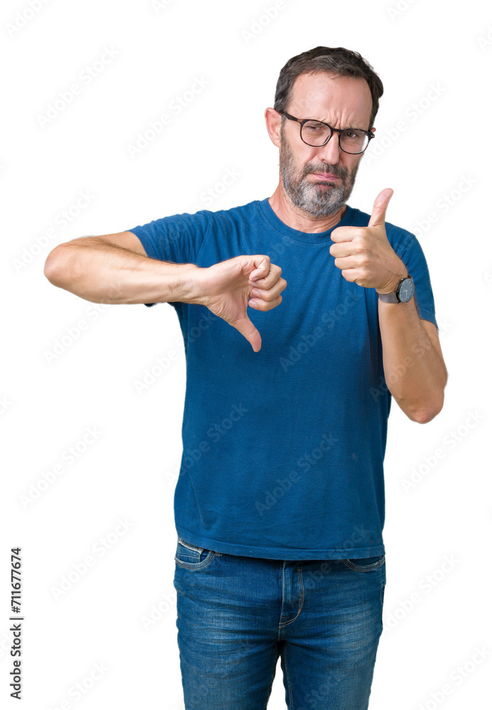 Naklejka premium Handsome middle age hoary senior man wearin glasses over isolated background Doing thumbs up and down, disagreement and agreement expression. Crazy conflict