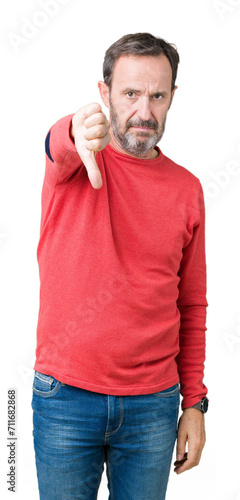 Handsome middle age hoary senior man wearing winter sweater over isolated background looking unhappy and angry showing rejection and negative with thumbs down gesture. Bad expression.