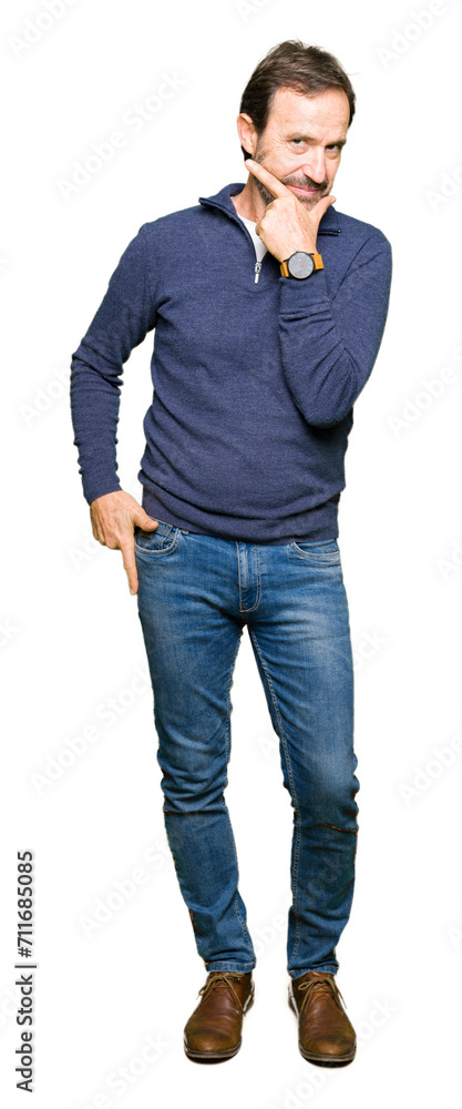 Middle age handsome man wearing a sweater looking confident at the camera with smile with crossed arms and hand raised on chin. Thinking positive. Middle age handsome man wearing a sweater looking confident at the camera with smile with crossed arms and hand raised on chin. Thinking positive.