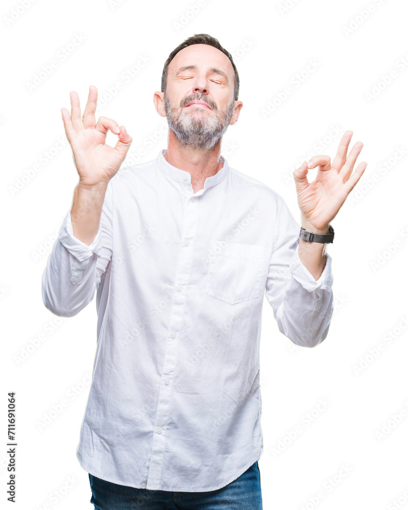 Middle age hoary senior man over isolated background relax and smiling with eyes closed doing meditation gesture with fingers. Yoga concept. Middle age hoary senior man over isolated background relax and smiling with eyes closed doing meditation gesture with fingers. Yoga concept.