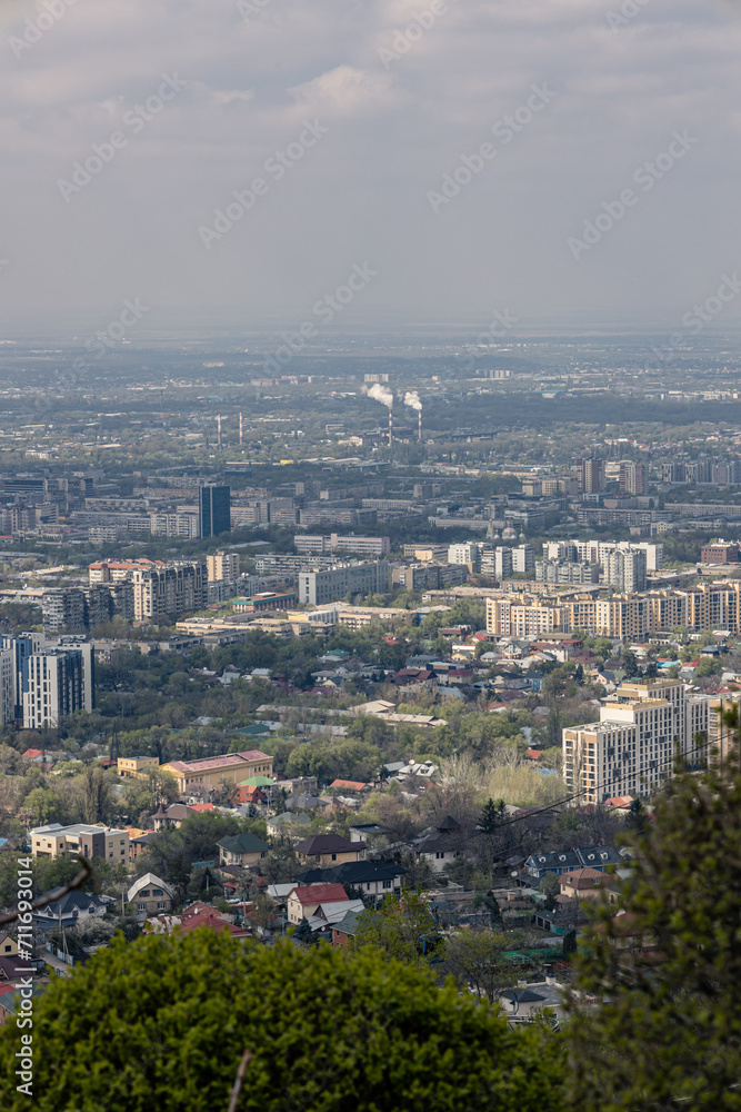 Environmental problems of large cities. Smog over the city of Almaty in Kazakhstan.