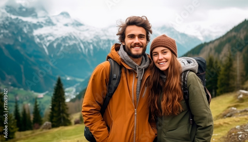 A group of tourists smiles and enjoys the beauty of the mountain in the Alps, creating a vibrant atmosphere of adventure, happiness, and leisure in the alpine landscape 