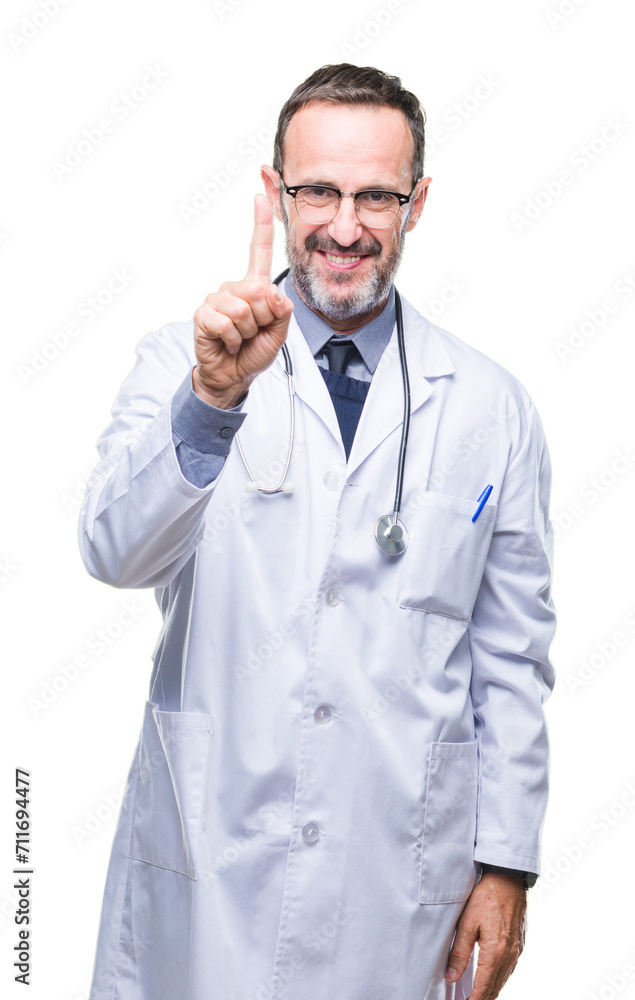 Middle age senior hoary doctor man wearing medical uniform isolated background showing and pointing up with finger number one while smiling confident and happy.