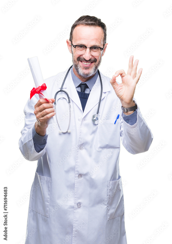Middle age senior hoary doctor man holding degree certificate over isolated background doing ok sign with fingers, excellent symbol Middle age senior hoary doctor man holding degree certificate over isolated background doing ok sign with fingers, excellent symbol