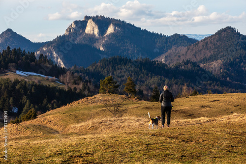 spending time with a dog during a mountain hike