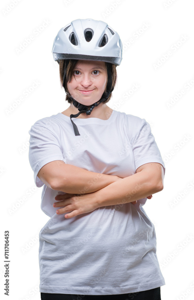 Young adult cyclist woman with down syndrome wearing safety helmet over isolated background happy face smiling with crossed arms looking at the camera. Positive person. Young adult cyclist woman with down syndrome wearing safety helmet over isolated background happy face smiling with crossed arms looking at the camera. Positive person.