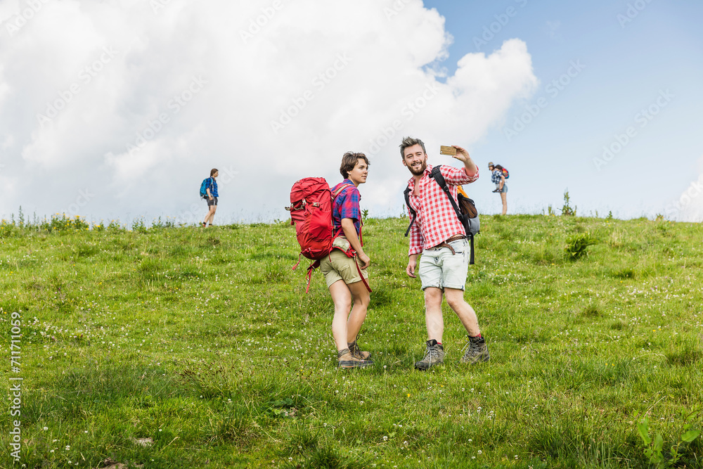 Couple hiking in the mountains. Achenkirch, Austria Couple hiking in the mountains. Achenkirch, Austria