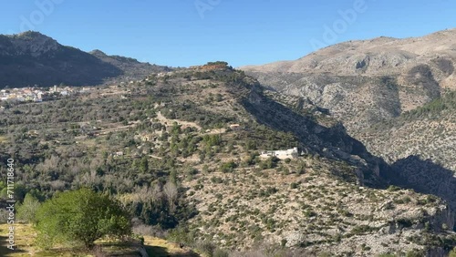 Panoramic view of the Hell's Ravine, or El Barranc de l'Infern, in La Vall de Laguar. One of the hardest hiking routes in Spain. The Cavall Verd mountain and the town Benimaurell are in the background