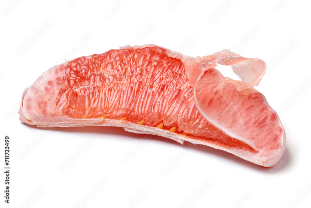 Slice of a peeled fresh red Pomelo isolated on white background close up Slice of a peeled fresh red Pomelo isolated on white background close up