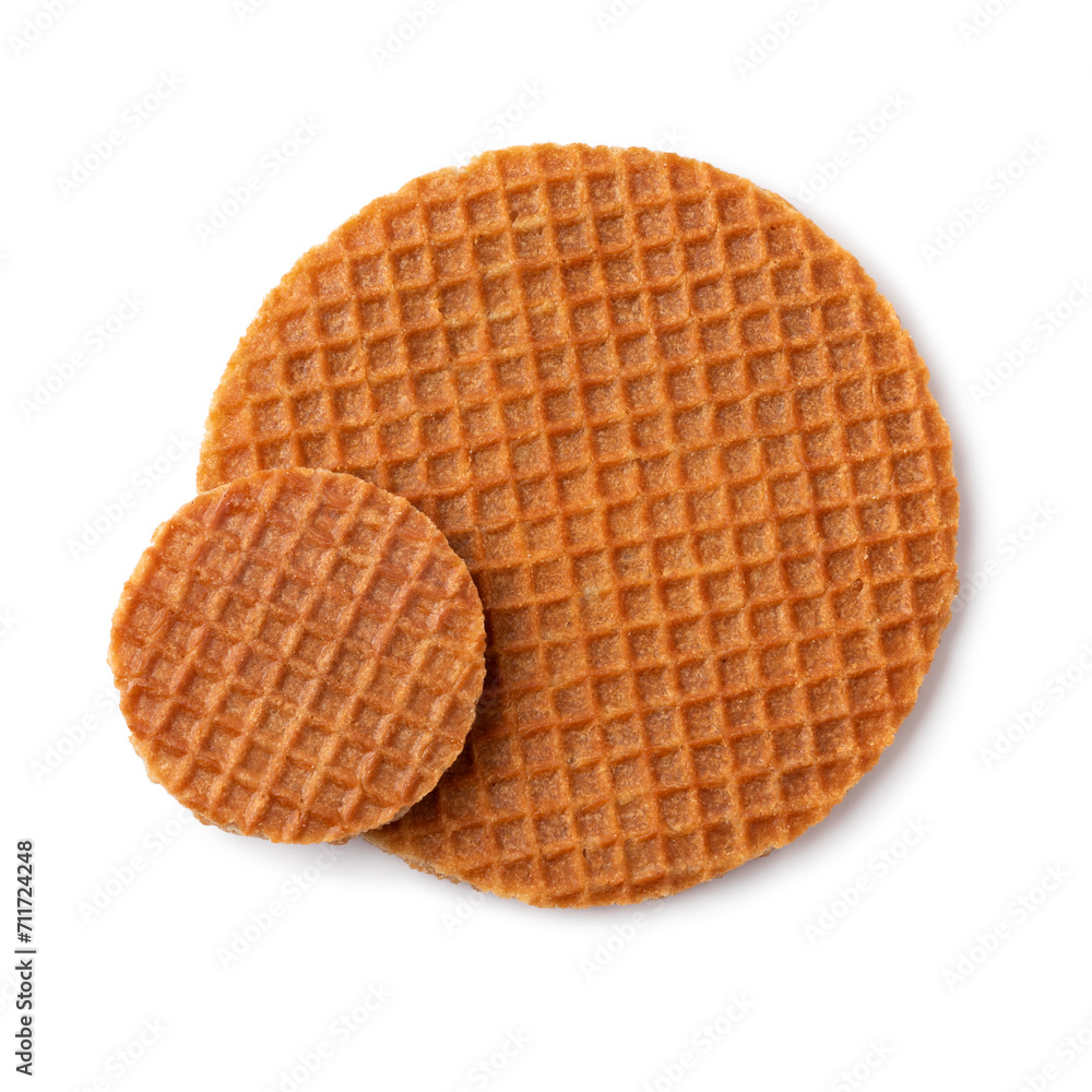 Large and mini fresh baked stroopwafel, syrup waffles, isolated on white background close up Large and mini fresh baked stroopwafel, syrup waffles, isolated on white background close up