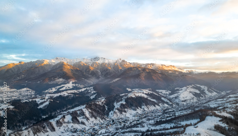 Fototapeta premium Aerial view of the Bucegi Mountains in Romania in winter