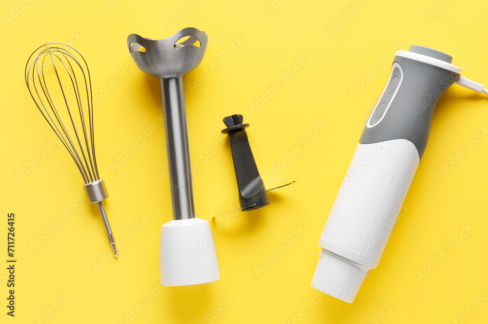 Fototapeta premium Electric blender on a yellow background. Top view. 