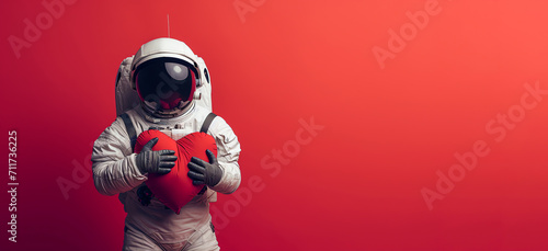 Astronaut hugging a large soft red heart on red background. Generative AI