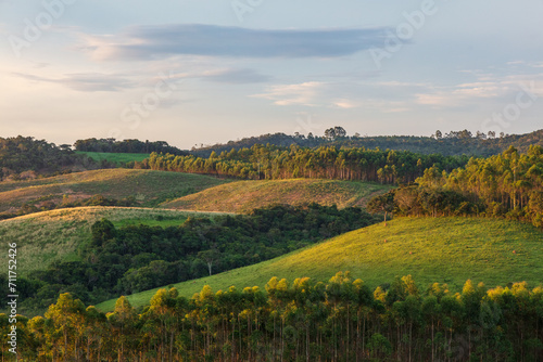 Landscape of the mountains of Minas Gerais during a late afternoon in the interior of the state. Farm environment that looks like Tuscany.