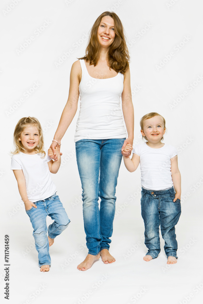 portrait of mother with her two young daughters portrait of mother with her two young daughters