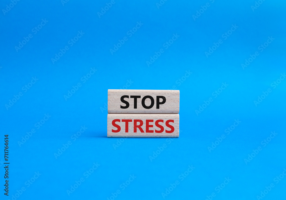 Stop Stress symbol. Concept word Stop Stress on wooden blocks. Beautiful blue background. Business and Stop Stress concept. Copy space Stop Stress symbol. Concept word Stop Stress on wooden blocks. Beautiful blue background. Business and Stop Stress concept. Copy space