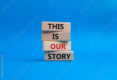 This is our Story symbol. Wooden blocks with words This is our Story. Beautiful blue background. Business and This is our Story concept. Copy space.