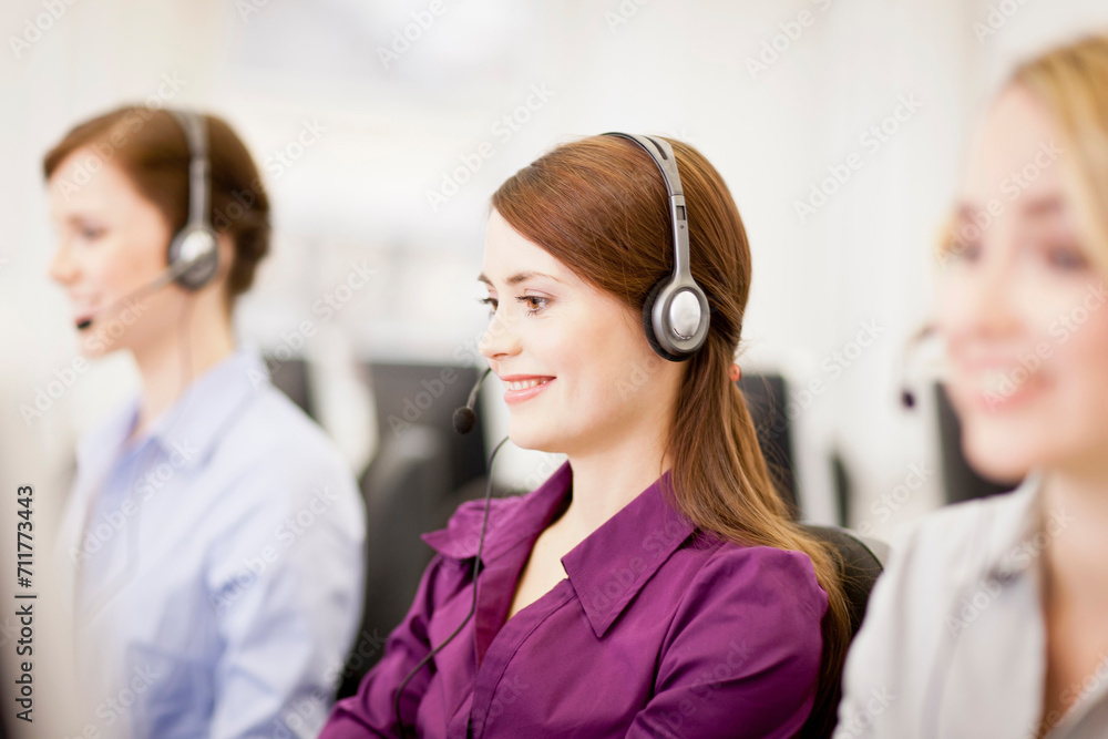 Colleagues working in a call center with a very friendly atmosphere. Munich, Germany Colleagues working in a call center with a very friendly atmosphere. Munich, Germany
