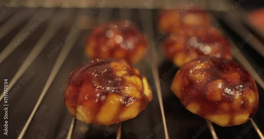 Cooking apple fillings for tarts with apples and jelly in the oven in a professional kitchen. Cooking apple fillings for tarts with apples and jelly in the oven in a professional kitchen.
