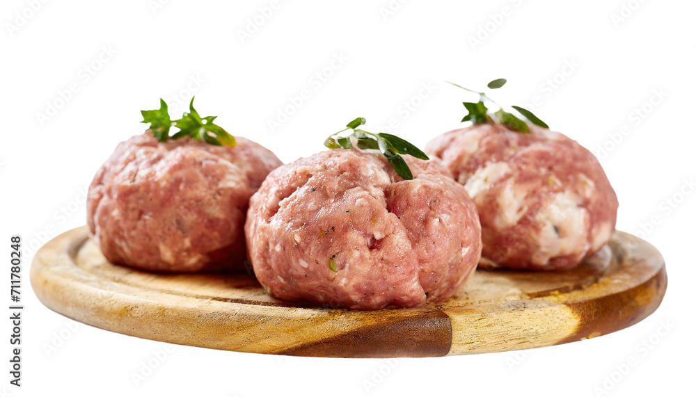 Raw meatballs on a white plate. Isolated on a transparent background.