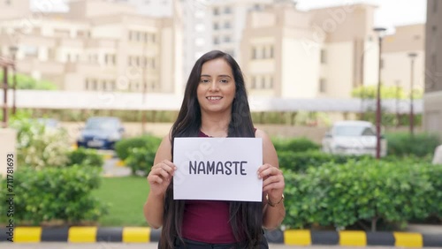 Wallpaper Mural Indian Woman standing with Namaste Poster Torontodigital.ca