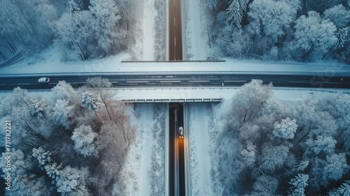 Icy Infrastructure, Long Shot of a Snow-Covered Highway with Abandoned Vehicles, Overhead Perspective, Capturing the Scale of Winter's Disruption photo