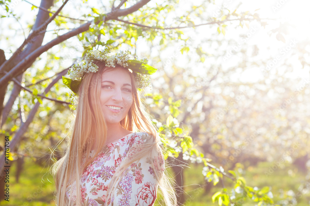 Beautiful romantic woman with long blond hair in a wreath Beautiful romantic woman with long blond hair in a wreath