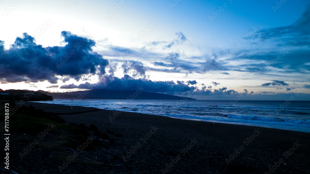 Dramatic sky over Atlantic Ocean, Ribiera Grande, Azores Islands.