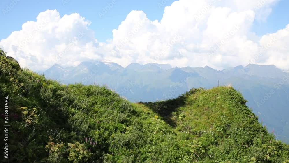 Peak of green beautiful mountain and cloudy sky at summer Peak of green beautiful mountain and cloudy sky at summer