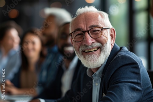 Smiling senior man at a business meeting