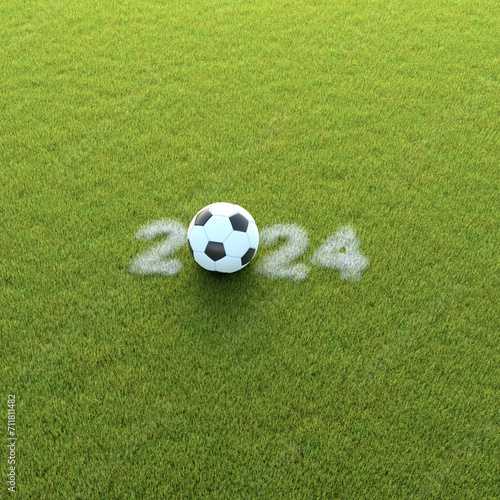 Soccer ball in the year 2024 displayed as chalk marking in the grass. Plenty of copy space around for cropping. Concept for all soccer events in 2024.