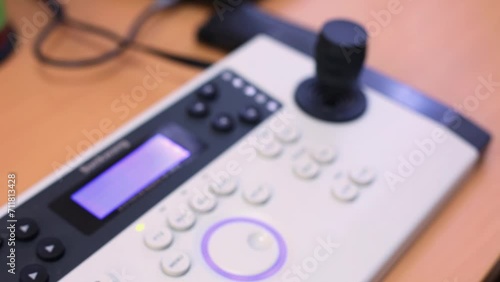 Close-up remote control panel with joystick and ring. photo