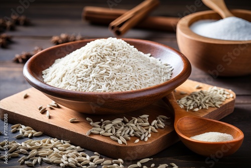 Cumin and caraway seeds in white spoon on wooden board, aromatic spices for cooking and seasoning