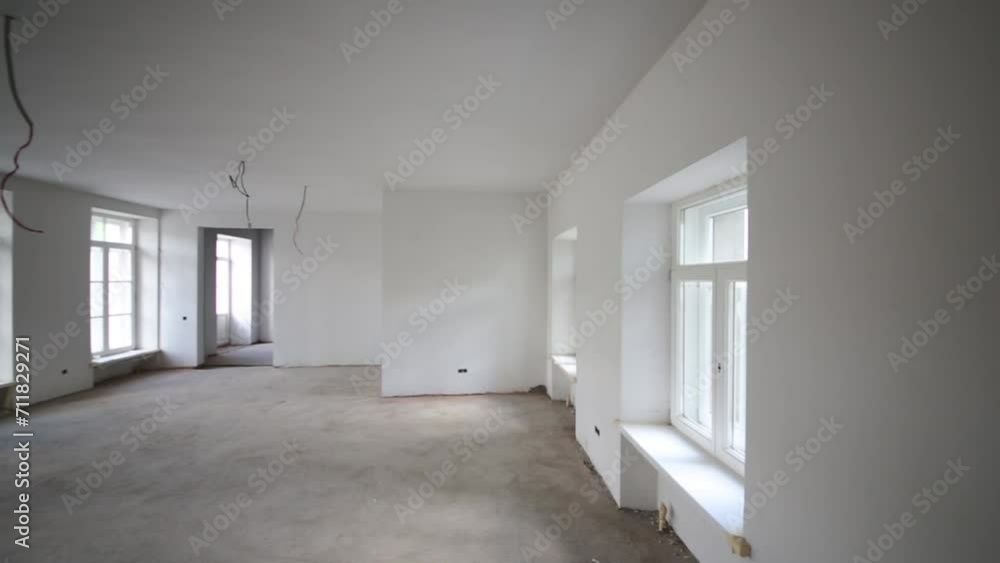 Indoor view of white room without finishing in building Indoor view of white room without finishing in building