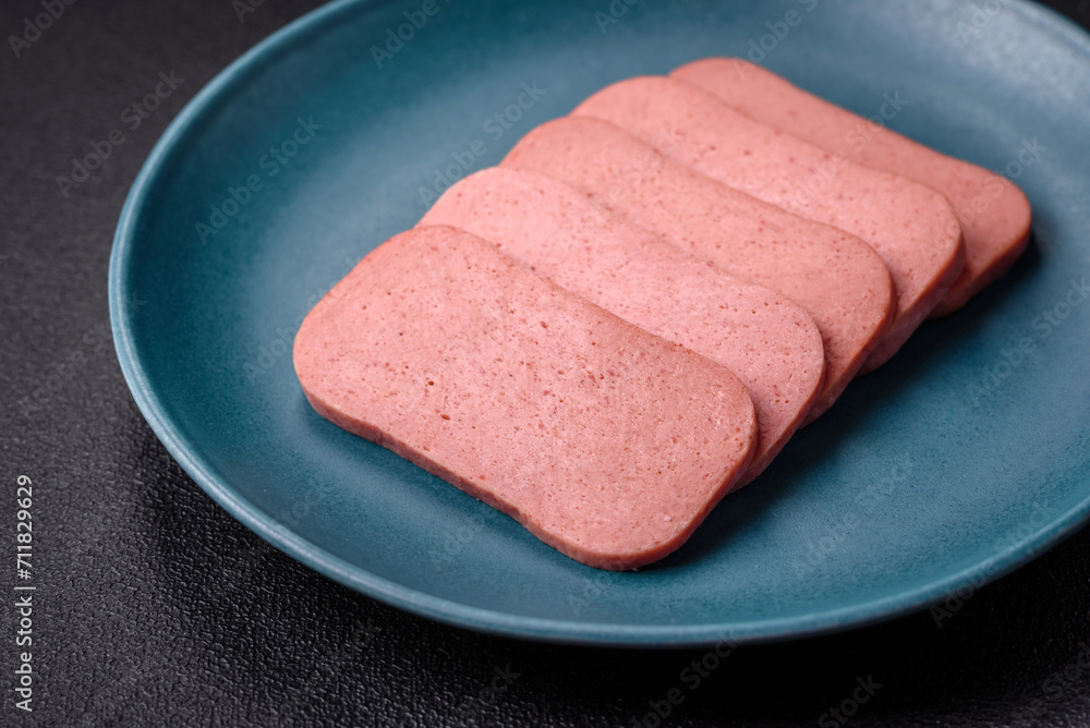 Delicious canned pink ham with salt, spices and herbs Delicious canned pink ham with salt, spices and herbs