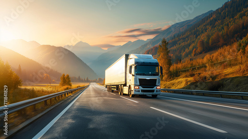 Autumn trucking in mountainous region, white commercial truck on highway, golden sunrise, freight transport, scenic autumn, transport logistics.
