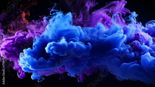 Person standing in between color smoke bombs