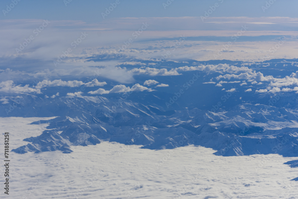 Alps mountain aerial view in a cloudy day