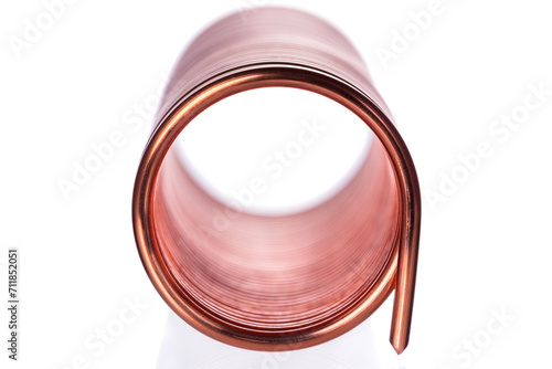 Spiral copper wire on white background photo