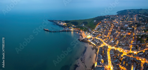 Aerial night view of the famous travel destination, Swanage, Dorset, South West England. blue hour winter