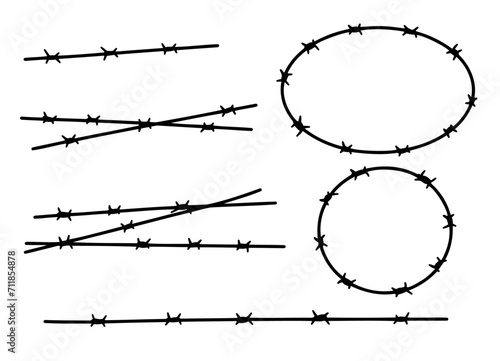 Barbed Wire. Barbwire chain boundary. Sharp spike chain. Security and protection. Military border, element of army camp and jail, prison. Border and barrier photo
