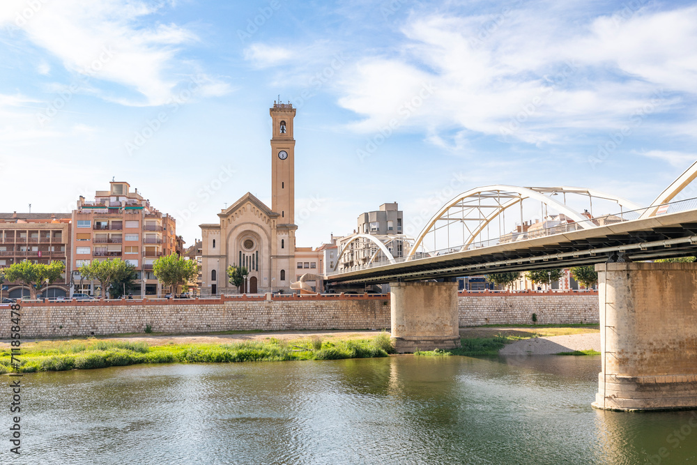 Church of Our Lady of the Rosary and the State bridge over Ebro river in Tortosa, comarca of Baix Ebre, Province of Tarragona, Catalonia, Spain