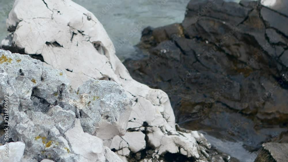 Calm background with stone and clean clear water near shore. Quiet background for contemplation with clean clear water of ocean. Calm background with stone and clean clear water near shore. Quiet background for contemplation with clean clear water of ocean.
