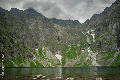 a blue mountain lake with beautiful views of the mountains