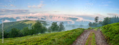 Foggy morning in the mountains. Amazing panorama of the Carpathian mountains. Ukraine, Europe