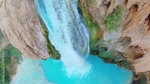 Havasu Creek with waterfall and small cave at autumn day  photo