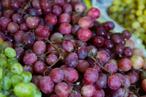 Wallpaper Mural Red grapes put on counter for sale alongside with other products in fruit and vegetable market Torontodigital.ca