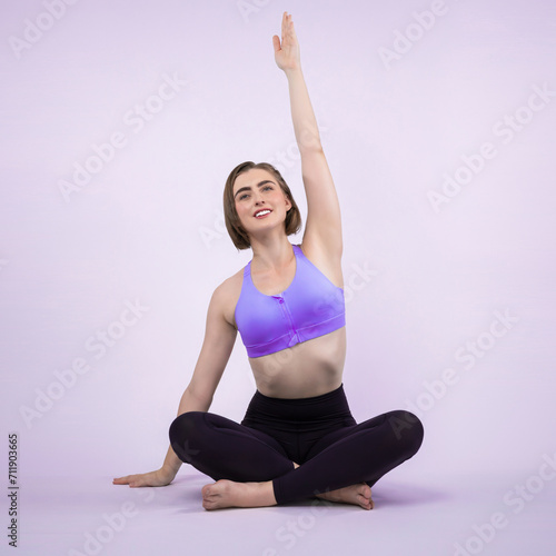 Full body length gaiety shot athletic and sporty woman doing healthy and meditative yoga exercise workout posture on isolated background. Healthy active and body care lifestyle