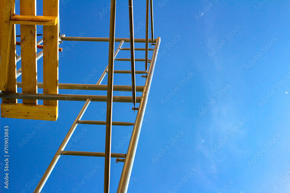 scaffolding close-up against a clear sky scaffolding close-up against a clear sky