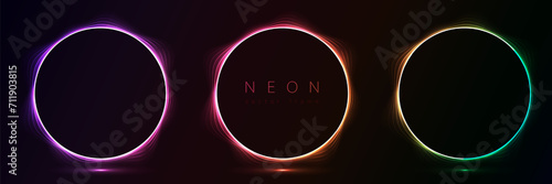 Set of glowing neon color circles round curve shape with wavy dynamic lines isolated on black background technology concept. Circular light frame border for badges, price tag, label cards, logo design